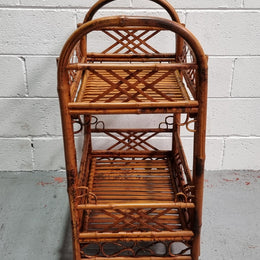 Excellent Vintage Tortoiseshell Bamboo two tier auto trolley. It has been sourced locally and is in fantastic original detailed condition .