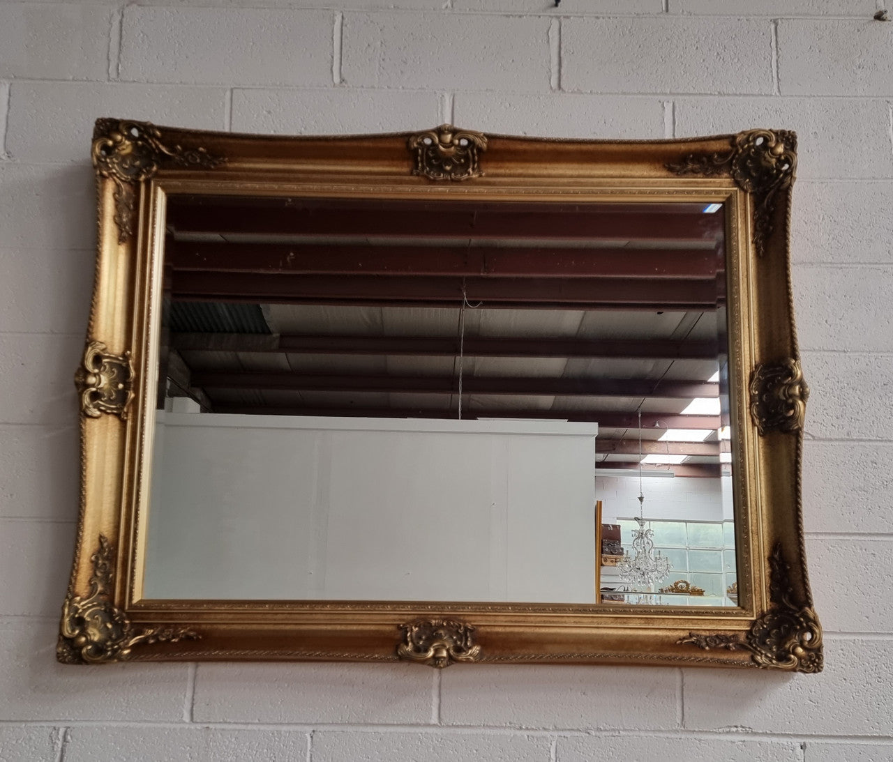 Decorative Vintage gilt bevelled mirror. In good original detailed condition.