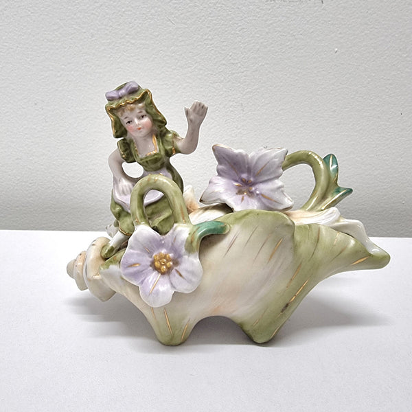 Charming Art Nouveau figural group. It has been sourced locally and is in good original condition. Please see pictures to form part of the description.