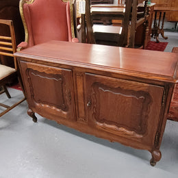 A hard to find Louis XV style French two door cabinet which would make an ideal TV cabinet. It has been sourced from France and in good original detailed condition.