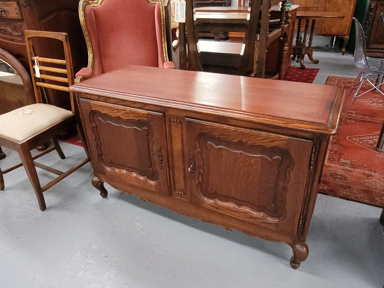 A hard to find Louis XV style French two door cabinet which would make an ideal TV cabinet. It has been sourced from France and in good original detailed condition.