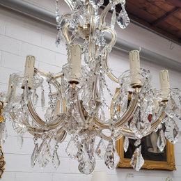 Impressive elegant ten arm French crystal chandelier that has been sourced from France. It has been fully rewired to Australian standards and is in good original working condition.