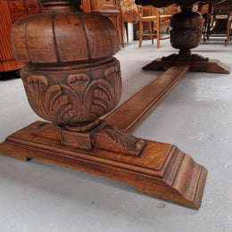 French Oak Renaissance style extension table with a stretcher base and heavily carved bulbous. When the table fully extends it measures 300 cm and can be used with both sides out or with only the one leaf out either side. It is in good original detailed condition.