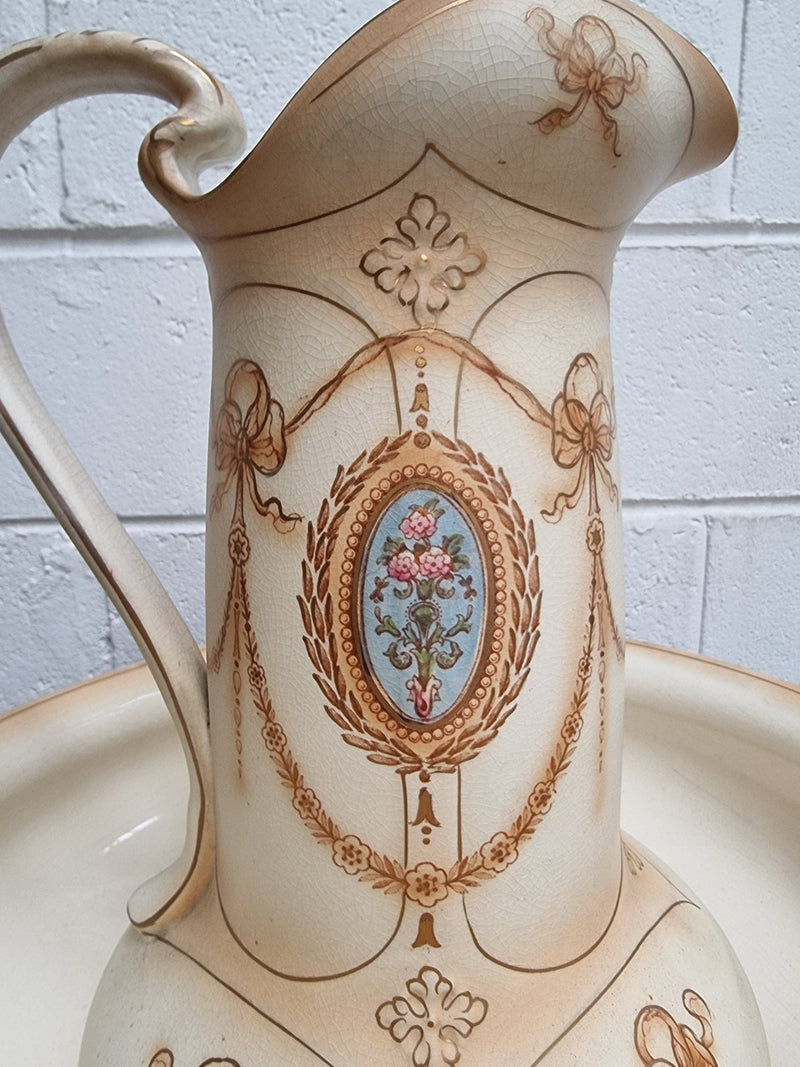 Charming large Crown Devon jug and basin set. Muted colors featuring garlands and floral medallions “Festoon Pattern” No chips or cracks in good condition commensurate with age