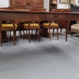 Antique French Oak Farmhouse table in fully restored condition. Features a single drawer and tapered legs.