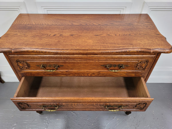 French Louis XV style Oak three drawer chest with wooden top. It has been sourced from France and is in good original detailed condition.