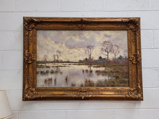 Sourced from France an impressionist oil painting of a beautiful lake scene. It is nicely framed in an Antique frame and in good original detailed condition.