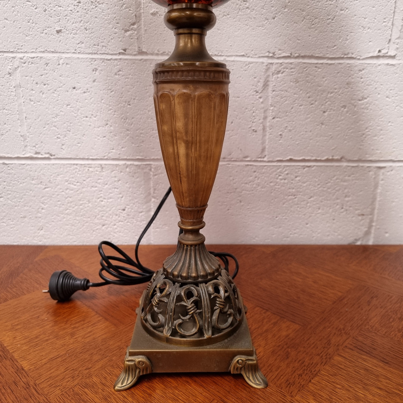 Beautiful pair of metal and glass lamp bases with new gold shades. They are in good original working condition and have been sourced locally.