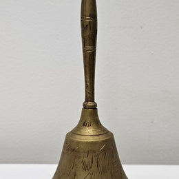 Vintage brass bell with engraved lines and markings on the insde. Please see photos as they form part of the description. In good original condition.