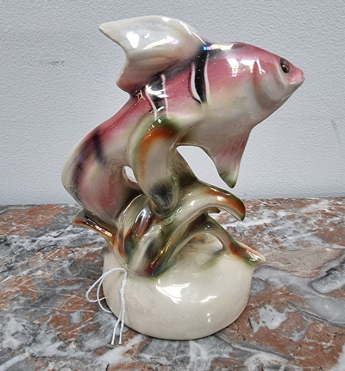 Vintage “Jema Holland” ceramic fish and snail statuette.