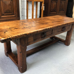 Fabulous small French oak coffee table, with two drawers and lovely character in good condition.
