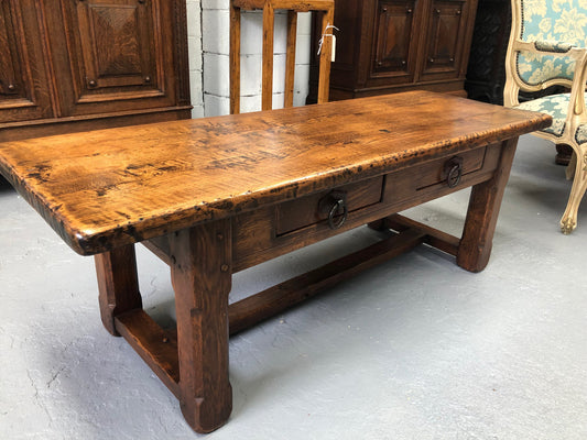 Fabulous small French oak coffee table, with two drawers and lovely character in good condition.