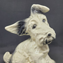 Charming vintage black and cream ceramic dog ornament. In good original condition.