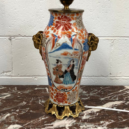 Stunning Japanese Imari style base with detailed french ormolu mounts. It is in good original working condition.
