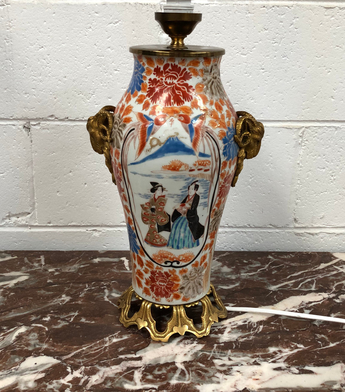 Stunning Japanese Imari style base with detailed french ormolu mounts. It is in good original working condition.