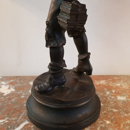 Fabulous French bronze statue of a school boy from the early 20th century. Signed by Marcel Debut ( 1865-1933) and its titled School Boy.