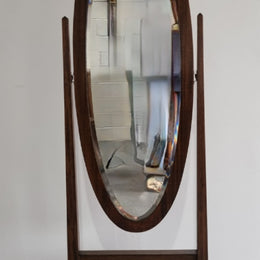 Lovely simple Antique Walnut cheval mirror with original bevelled mirror. In good original detailed condition.