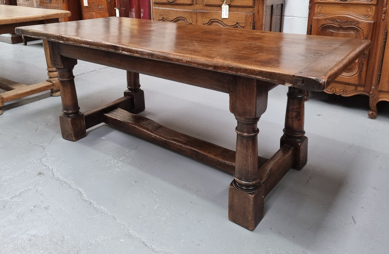 Lovely vintage French dark Oak pedestal base Farmhouse table. It can comfortable sit eight and it is in good original condition.