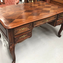 Antique French Walnut and parquetry top Louis XV style partners desk. In good original detailed condition.