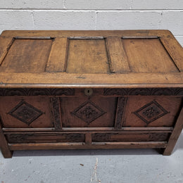 Early 19th Century French Oak carved coffer with a lift up lid for storage. A beautiful piece and in good original condition.