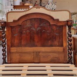 French 19th Century Walnut Henry II style queen sized bed with Barley Twist posts. Bed comes complete with custom made slats. Just place your mattress on top. In good original detailed condition.