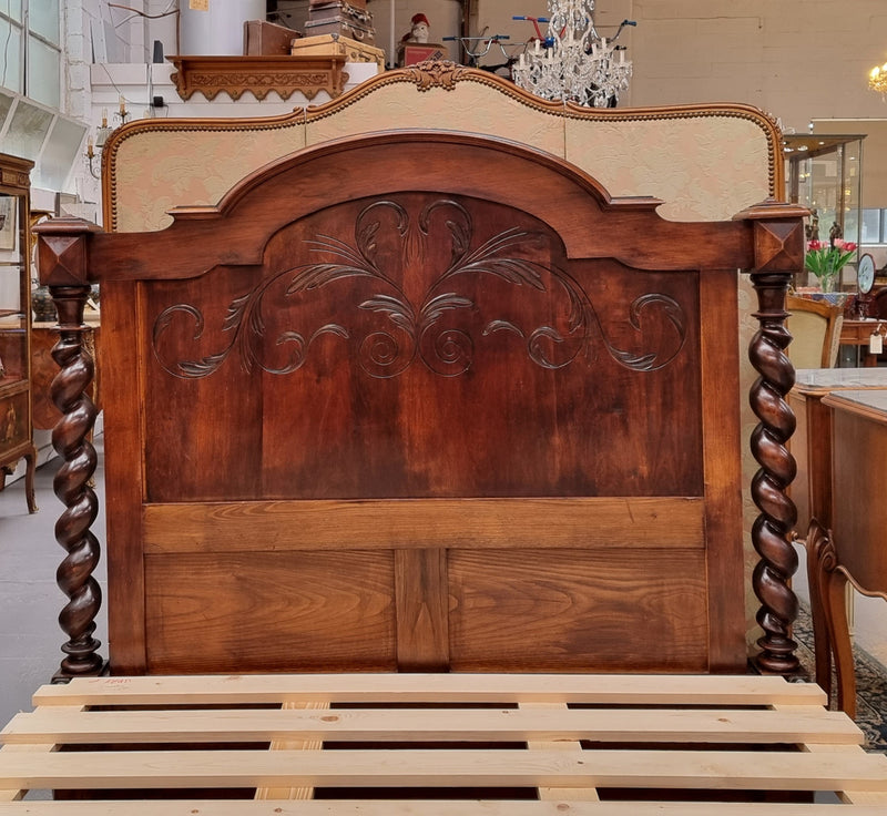 French 19th Century Walnut Henry II style queen sized bed with Barley Twist posts. Bed comes complete with custom made slats. Just place your mattress on top. In good original detailed condition.