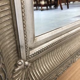 Beautiful Vintage French style silver gilt mirror of large proportions. This beautiful mirror could be used a freestanding floor mirror or it has a wire so it can be hung up on wall as well. It is in good original condition.