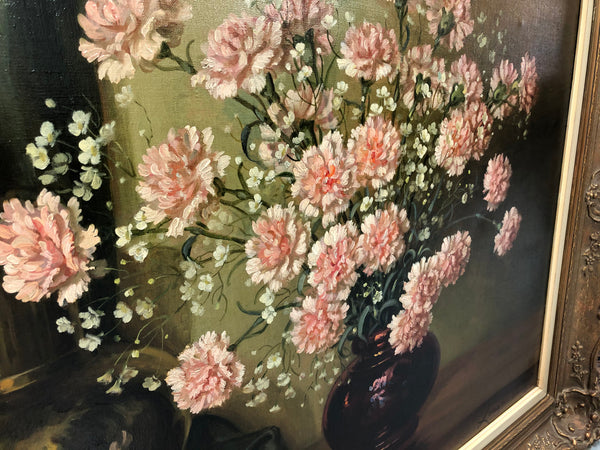 A signed oil on canvas painting of Carnations flowers in an ornate gilt original frame. Circa 1900's in good original condition.