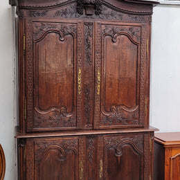 French Oak 18th Century superbly carved sideboard buffet. This amazing buffet has loads of character which is expected being circa 1790's. The top section has two fixed shelves and the bottom section has one fixed shelf. It has been sourced from France and is in good original detailed condition.