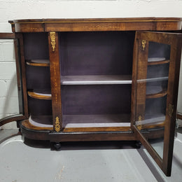 Victorian Rosewood inlaid side cabinet/credenza with velvet lined shelves and gilt mounts. It has been sourced locally and is in good original condition with loads of character.