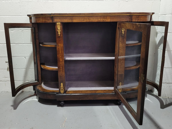 Victorian Rosewood inlaid side cabinet/credenza with velvet lined shelves and gilt mounts. It has been sourced locally and is in good original condition with loads of character.