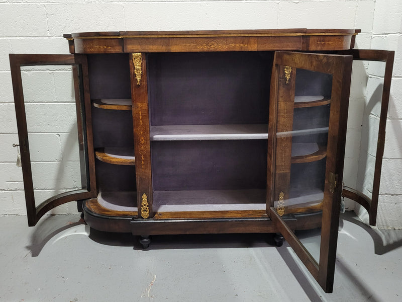 Victorian Rosewood inlaid side cabinet/credenza with velvet lined shelves and gilt mounts. It has been sourced locally and is in good original condition with loads of character.