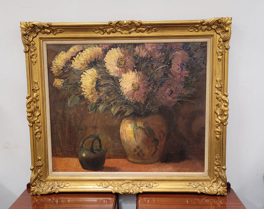 French signed oil on canvas depicting floral still life in charming gilt frame. Sourced from France and in good original detailed condition.