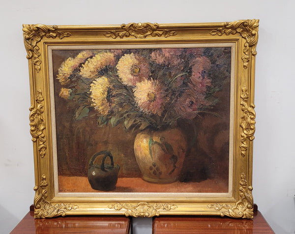 French signed oil on canvas depicting floral still life in charming gilt frame. Sourced from France and in good original detailed condition.