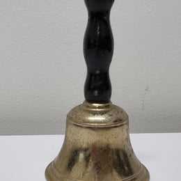 Wooden handled brass bell. It is in good original condition and has been sourced locally. Please view photos as they help form part of the description.