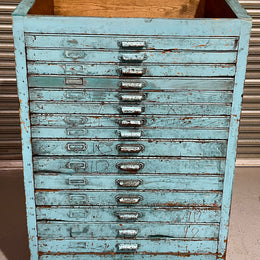 Fabulous set of vintage painted blue printers drawers that have adjustable separators which can be taken out for large papers. The drawers are various sizes and there is a section on top for working on or for storing brushes or tall items . These would be perfect for artists or jewellery pieces or even architects. Such a beautiful piece of industrial furniture.