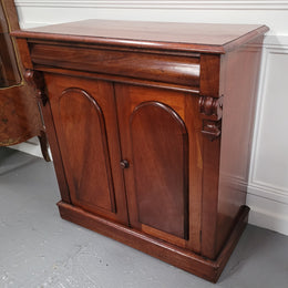 Cedar side cabinet with two doors one drawer and lovely door panels and corbels. It has been sourced locally and is in good original detailed condition.