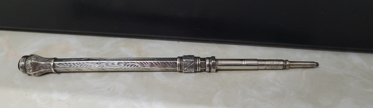Interesting sterling silver and amethyst propelling and extending pencil. In good original condition, please view photos as they help form part of the description.