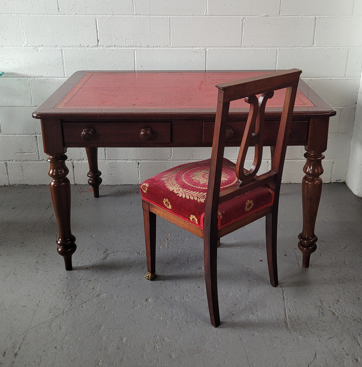 Victorian Cedar two drawer tooled leather topped desk with turned legs. In good original condition.