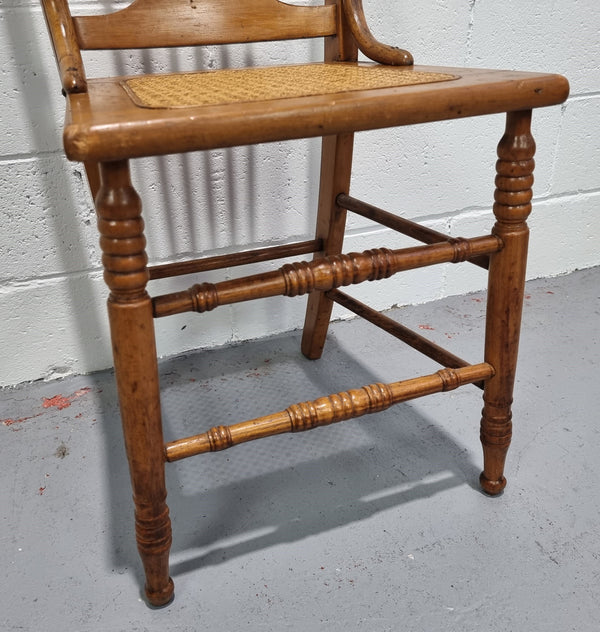 Australian Emu chair with cane inset seat. In good original condition.