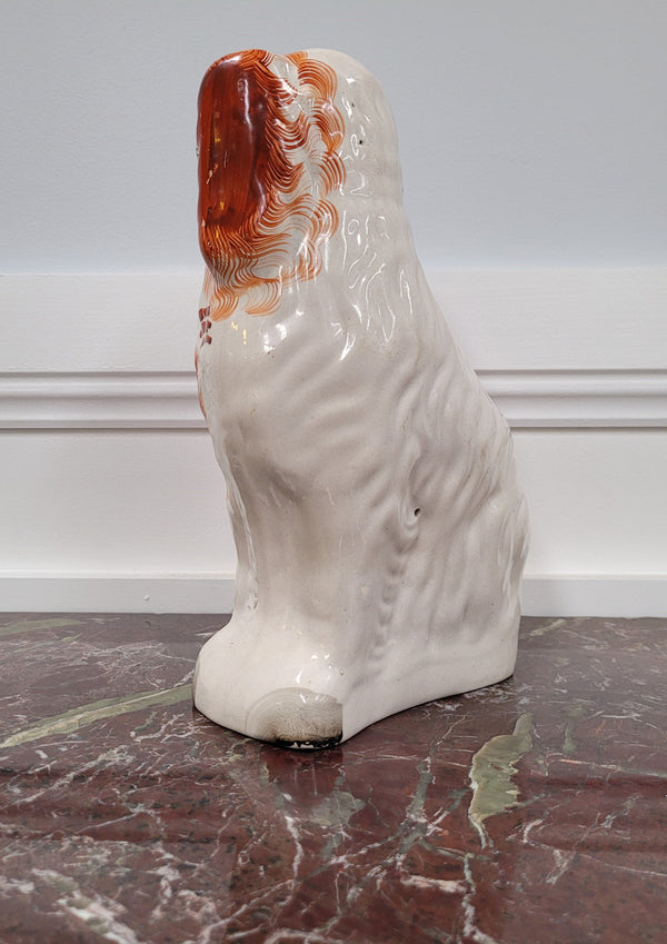 Antique Staffordshire dog statue. Please view photos as they help form part of the description.