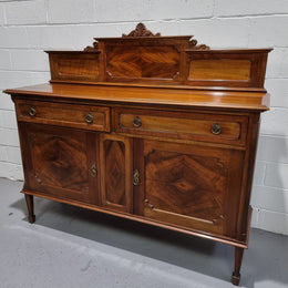 Fabulous Antique two door Blackwood and Fiddleback sideboard with lovely presence and also plenty of room for storage. In original detailed condition.