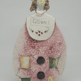Signed pastel ceramic Italian clown figure. In good original condition.