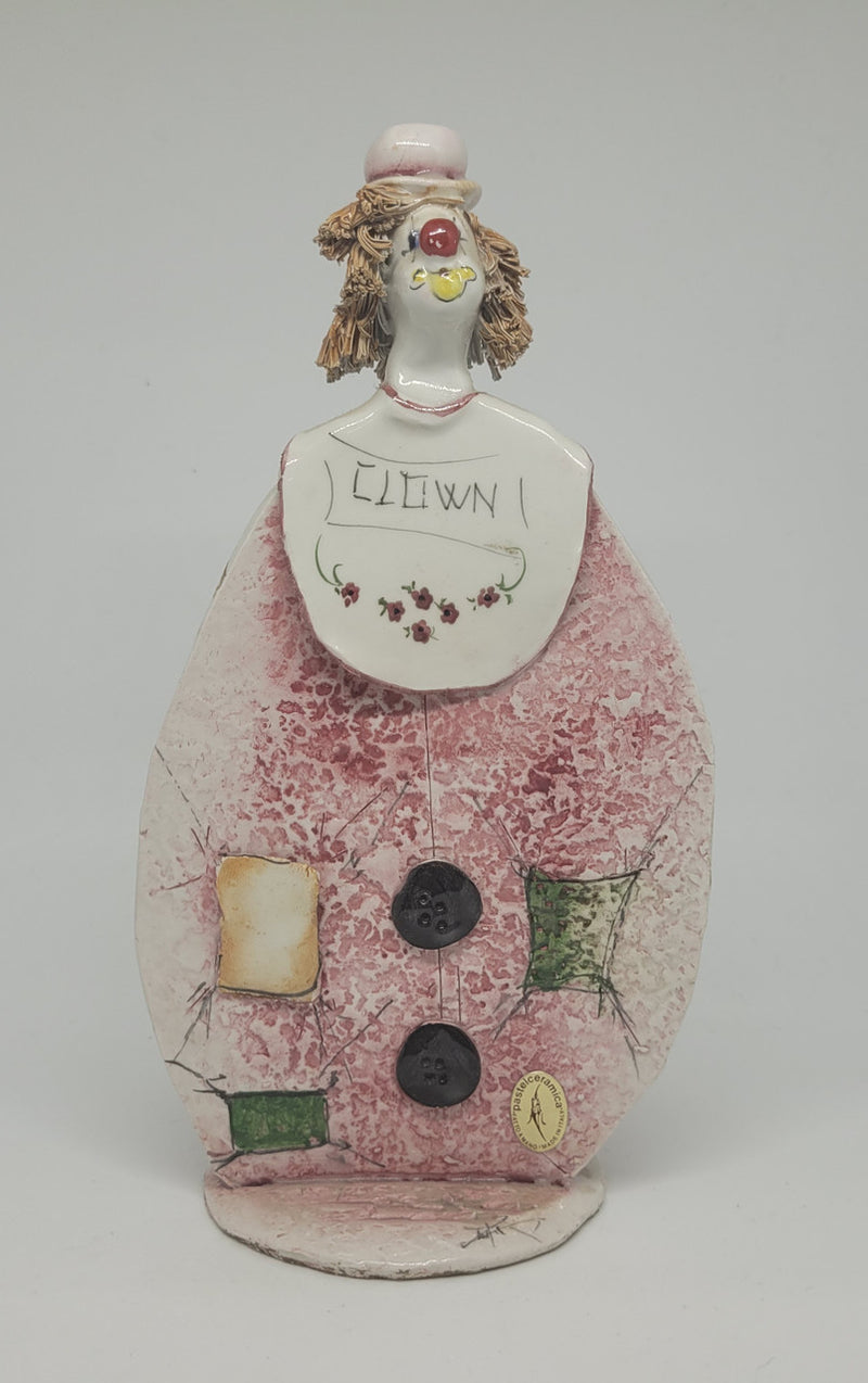 Signed pastel ceramic Italian clown figure. In good original condition.