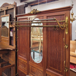 Attractive French Burr Walnut Hallstand. It has a single drawer, cupboard, brass rods, umbrella storage and a marble shelf. It is in good original condition. Please see photos as they form part of the description.