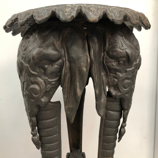 French patina bronzed plant stand of three elephant heads and trunks. Crica 1900's and in good original condition.