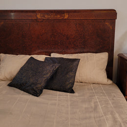 French Art Deco bedroom suite consisting of queen size bed in Amboyna wood and featuring pretty inlay. It comes with a matching pair of bedsides. It is a very stylish and high quality suite. It has been sourced from France and is in good original detailed condition.