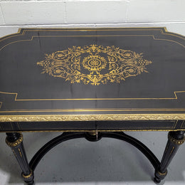 19th Century Napoleon III boulle ebonized centre table. Beautiful decorative mounts and has a drawer on one side. In good restored condition.
