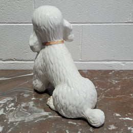 Vintage Italian ceramic Poodle figurine. It is beautifully detailed and in good original condition with no chips or cracks does have crazing to glaze.