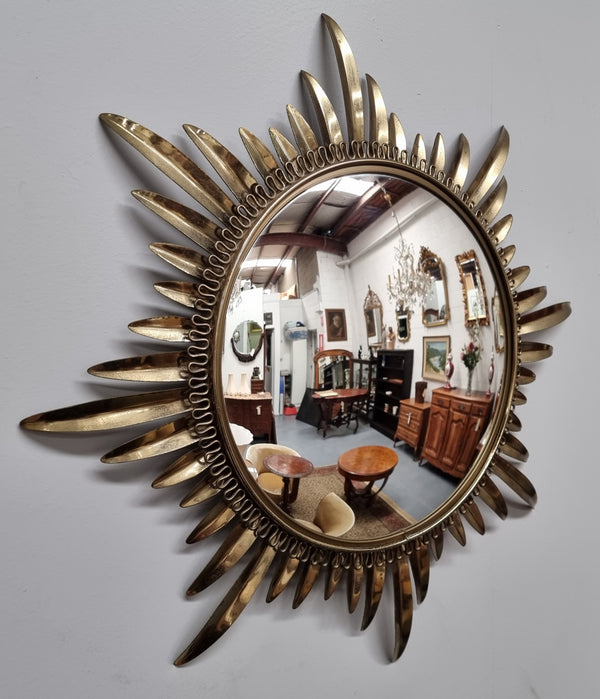 Stunning Vintage starburst convex mirror. It has been sourced from France and in good original detailed condition.